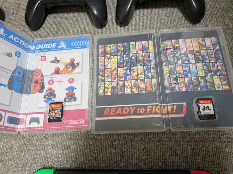 ニンテンドースイッチとソフト２本、コントローラー3個（ゲーム機本体・ゲームソフト）の商品画像 - 査定依頼日：2026年10月12日 - 最高査定価格：15,000円