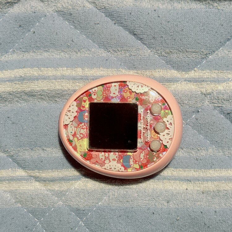 たまごっち サンリオミーツ バージョン（ゲーム機本体・ゲームソフト）の商品画像 - 査定依頼日：2025年5月11日 - 最高査定価格：10,000円