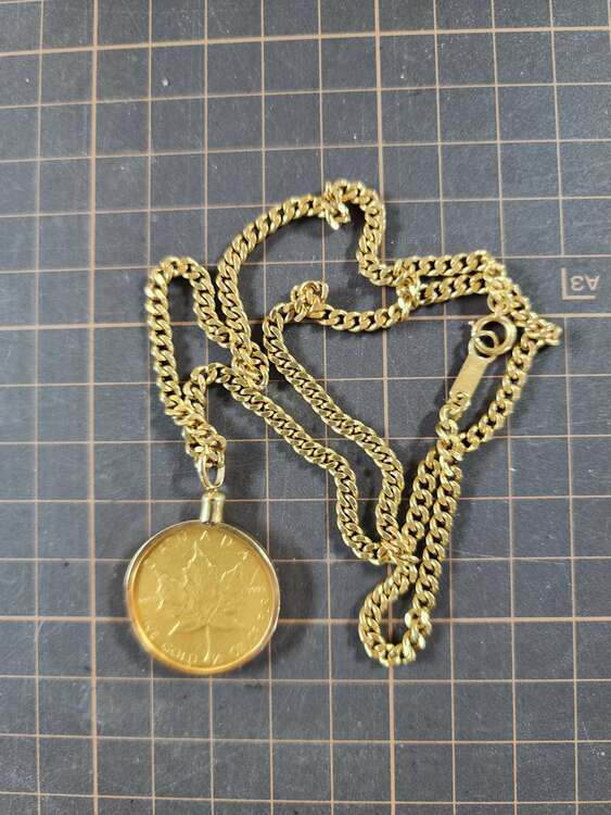 メイプルリーフ1/2oz.K18ヘッダー喜平チェーン付き全重量40g （金・貴金属）の商品画像 - 査定依頼日：2025年4月11日 - 最高査定価格：520,000円