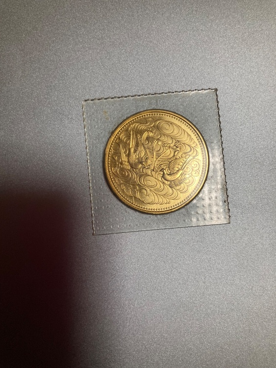 昭和天皇御在位60年記念10万円金貨　昭和61年（金・貴金属）の商品画像 - 査定依頼日：2026年8月22日 - 最高査定価格：477,000円