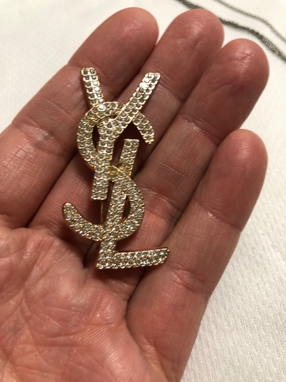 イヴ・サンローラン　ブローチ　ゴールド　ラインストーン（宝石）の商品画像 - 査定依頼日：2025年12月18日 - 最高査定価格：100,000円