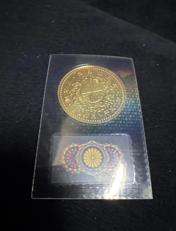 天皇陛下御即位記念 10万円金貨（金・貴金属）の商品画像 - 査定依頼日：2026年6月21日 - 最高査定価格：705,000円
