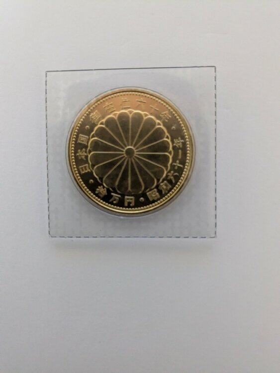 御在位60年拾万円純金硬貨（金・貴金属）の商品画像 - 査定依頼日：2026年7月9日 - 最高査定価格：100,000円