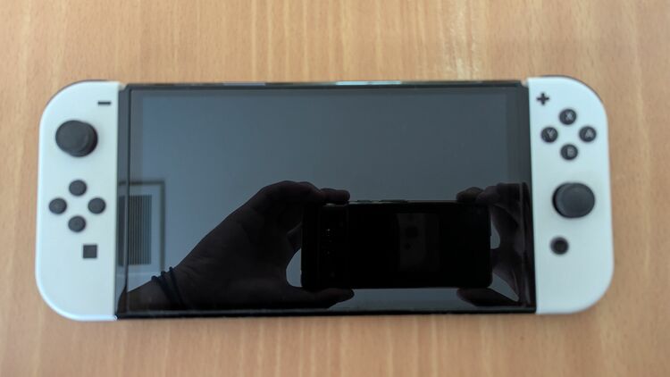 任天堂Switch有機ELモデル　ホワイト（ゲーム機本体・ゲームソフト）の商品画像 - 査定依頼日：2025年6月7日 - 最高査定価格：14,000円