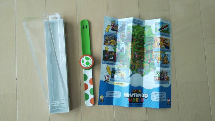 SUPER　NINTENDO　WORLD　POWER　UP 　BAND　ヨッシー（その他のおもちゃ）の商品画像 - 査定依頼日：2025年9月22日 - 最高査定価格：1,000円