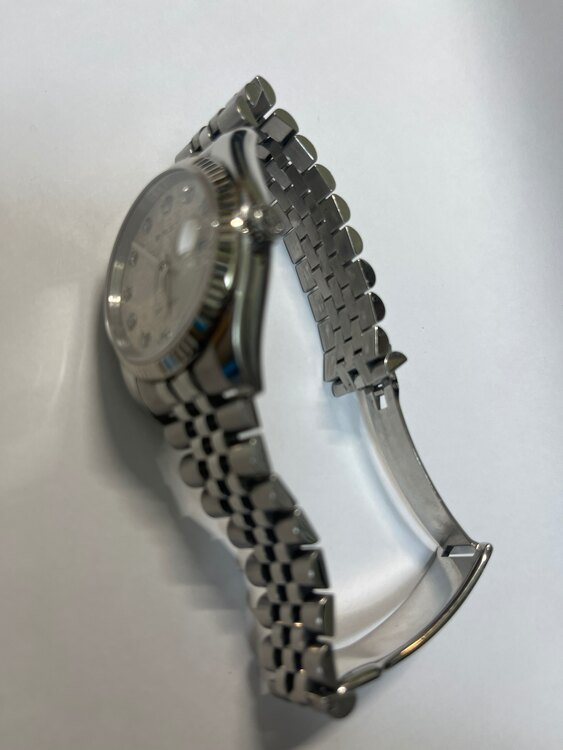 ロレックス デイトジャスト 116234JシルバーV52991（高級時計）の商品画像 - 査定依頼日：2025年1月11日 - 最高査定価格：1,200,000円