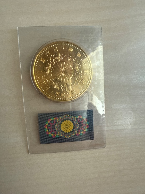 天皇陛下御即位記念 10万円金貨（金・貴金属）の商品画像 - 査定依頼日：2025年6月30日 - 最高査定価格：489,000円