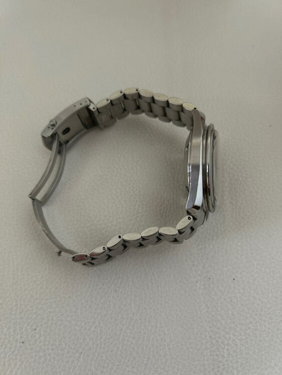 オメガ スピードマスター 7716060（高級時計）の商品画像 - 査定依頼日：2025年4月16日 - 最高査定価格：600,000円