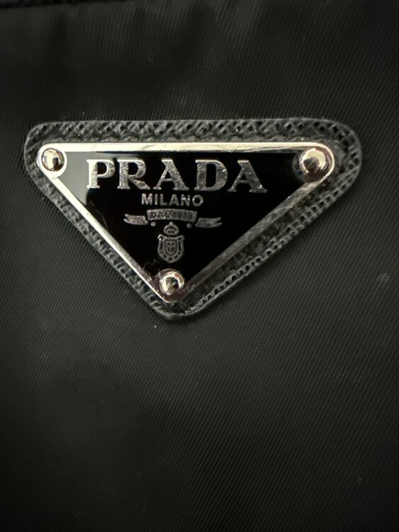 Re-Nylon スマートフォンケース（ブランドバッグ）の商品画像 - 査定依頼日：2025年3月17日 - 最高査定価格：100,000円