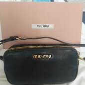 ミュウミュウミニポーチバック（ブランドバッグ）の商品画像 - 査定依頼日：2024年5月17日 - 最高査定価格：30,000円