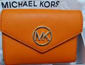 MICHAEL KORS　オレンジ財布（ブランド財布・小物）の商品画像 - 査定依頼日：2023年11月28日 - 最高査定価格：1,500円
