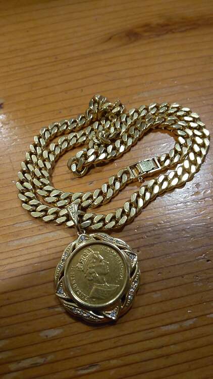 ネックレス100gコイン14g（金・貴金属）の商品画像 - 査定依頼日：2025年1月30日 - 最高査定価格：1,344,204円