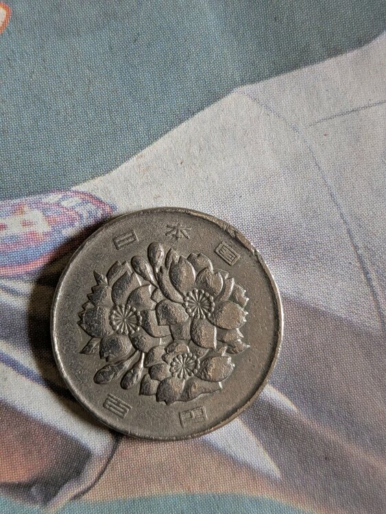 100円玉ヘラ付きエラー幅広エラー（金・貴金属）の商品画像 - 査定依頼日：2026年4月6日 - 最高査定価格：100,000円