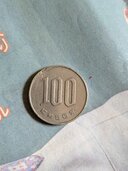 100円玉ヘラ付きエラー幅広エラー（金・貴金属）の商品画像 - 査定依頼日：2026年4月6日 - 最高査定価格：100,000円