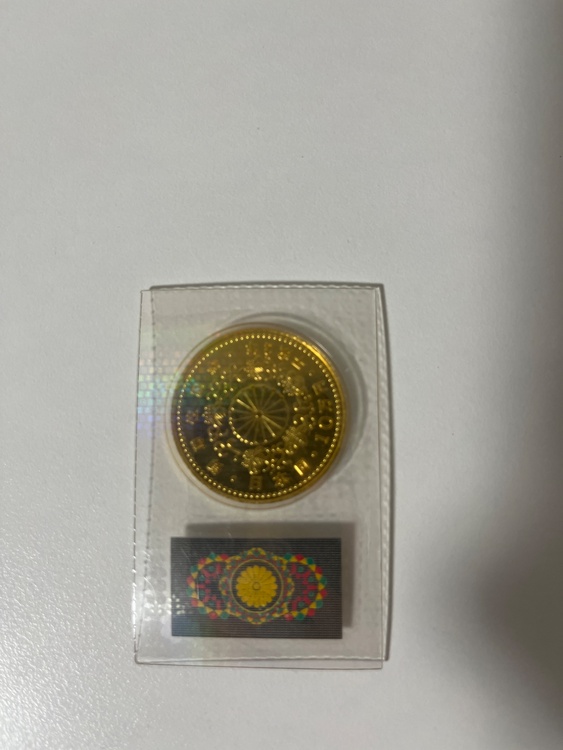 天皇陛下即位記念10万円金貨（金・貴金属）の商品画像 - 査定依頼日：2026年4月29日 - 最高査定価格：720,000円