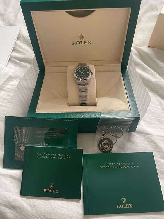 オイスターパーペチュアル　31mm  グリーン（高級時計）の商品画像 - 査定依頼日：2025年8月31日 - 最高査定価格：1,200,000円