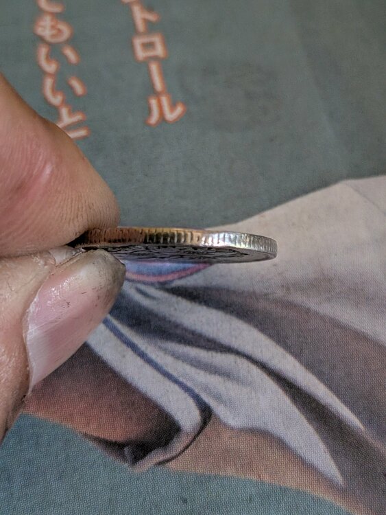 100円玉ヘラ付きエラー幅広エラー（金・貴金属）の商品画像 - 査定依頼日：2026年4月6日 - 最高査定価格：100,000円