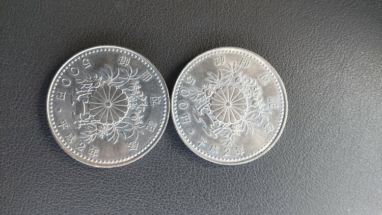 御即位平成2年記念硬貨500円4枚と昭和50年オリンピックピック100円記念硬貨（金・貴金属）の商品画像 - 査定依頼日：2026年1月23日 - 最高査定価格：100,000円